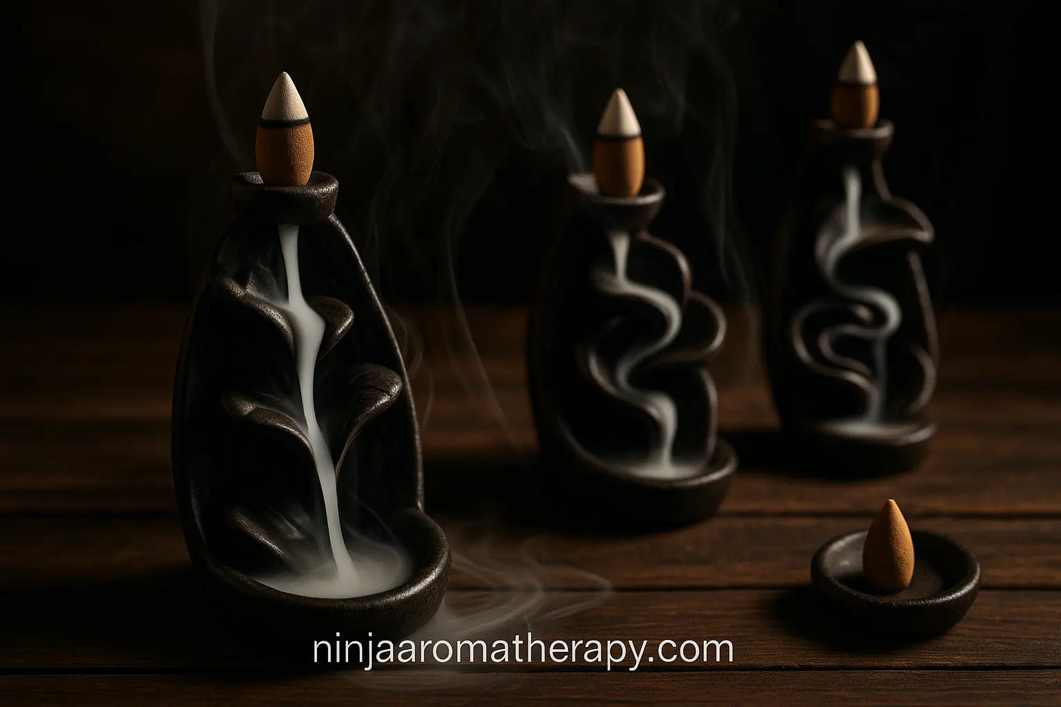 Backflow incense cones creating waterfall smoke effects for meditation and aromatherapy available at ninjaaromatherapy.com